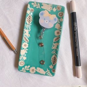Badge reel - blue bear yellow hair bow